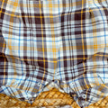 Pagliacetto neonato caldo cotone con fantasia tartan azzurra e marrone