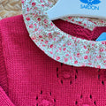 Abito bimba rosso bordeaux floreale con parte superiore in maglia e gonna fantasia