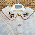 Completo bimba in cotone con blusa panna ricamata e pantalone tortora