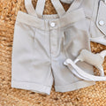 dettaglio completo cerimonia bimbo beige con papillon coordinato
