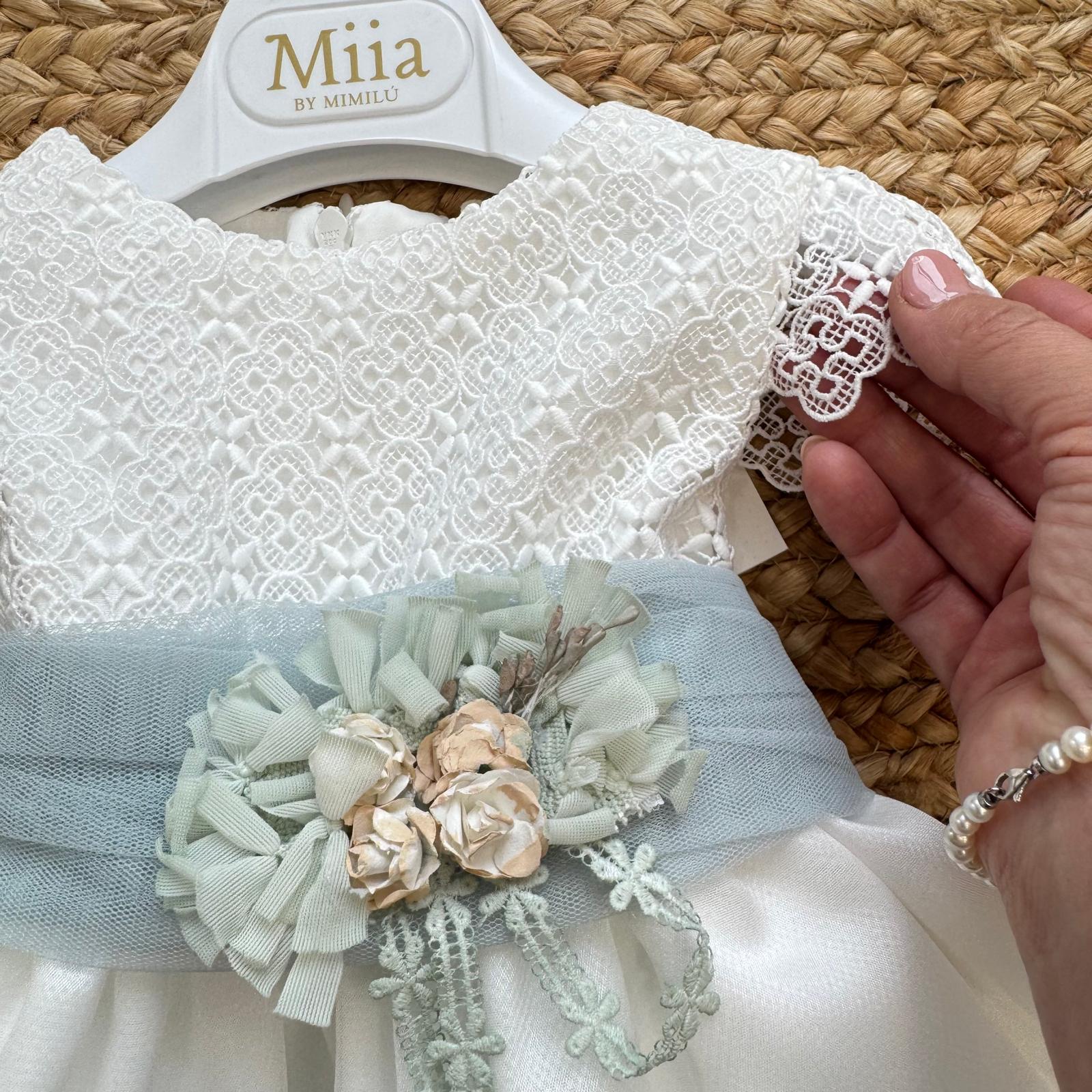 Dettaglio corpino in pizzo ricamato bianco