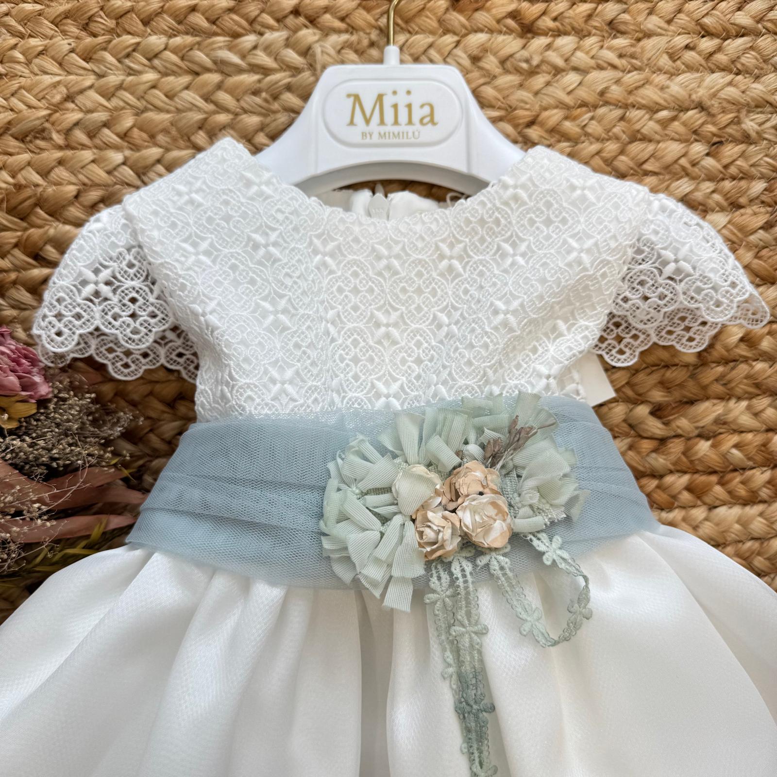 Dettaglio corpino in pizzo ricamato bianco