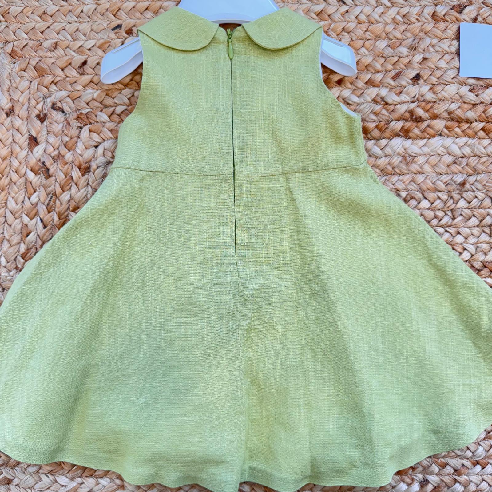 dettaglio fiocco floreale abito bambina