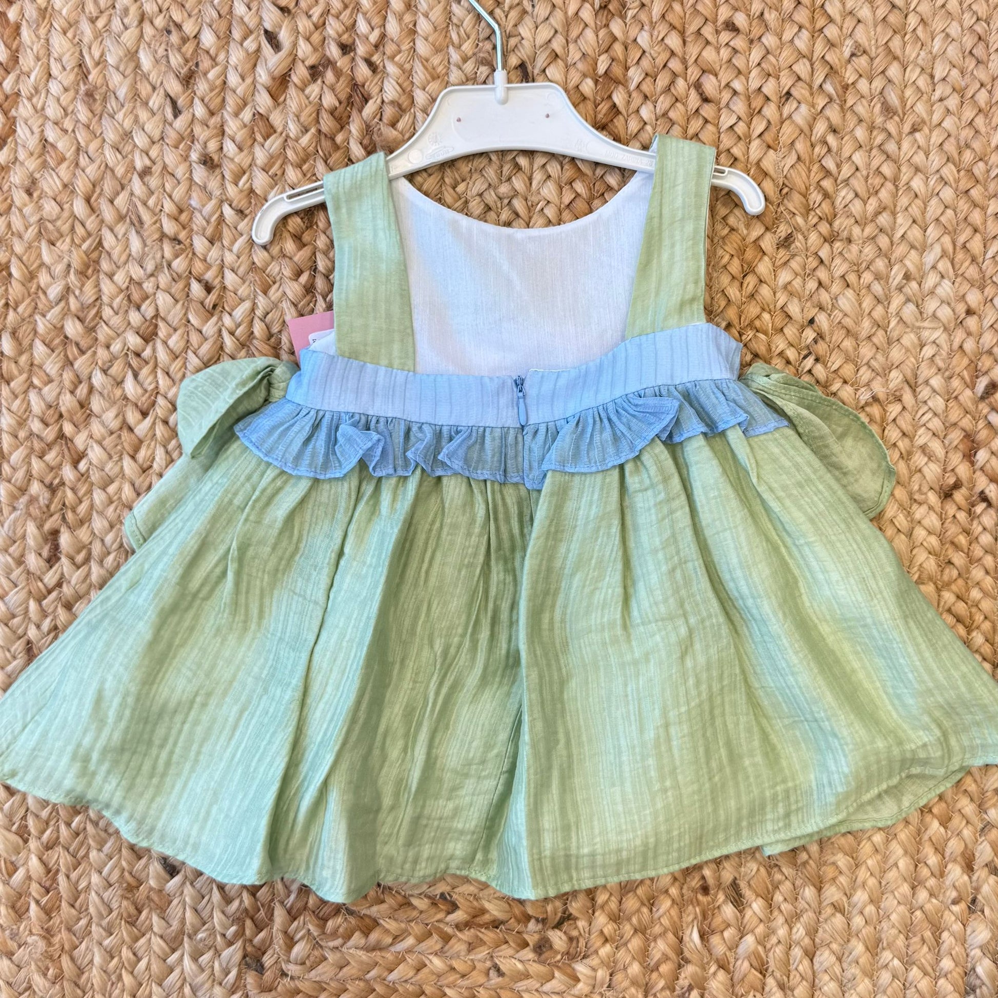 dettaglio fiocco laterale vestito bambina elegante