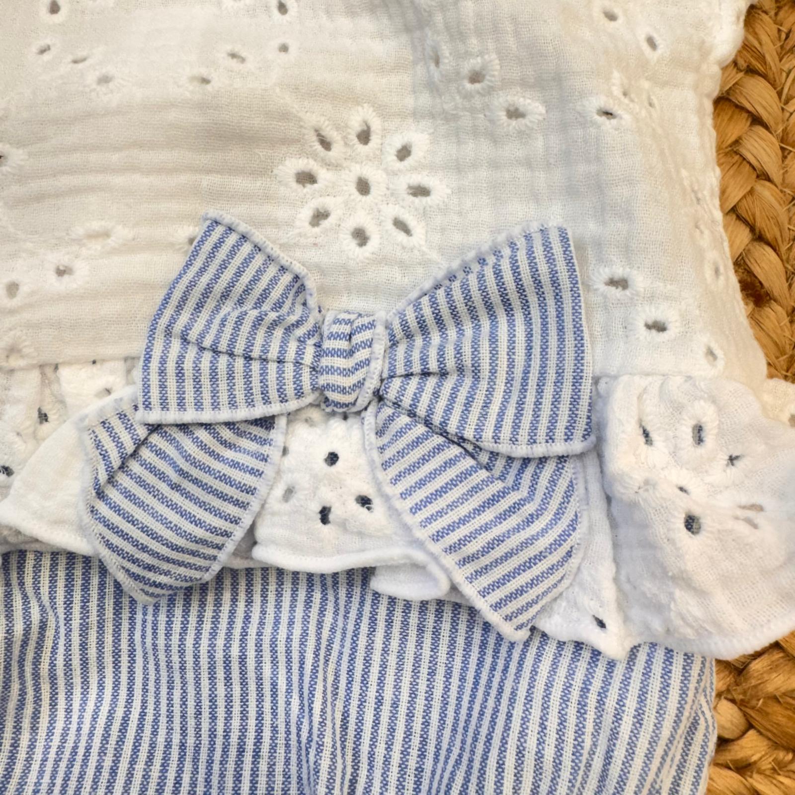 dettaglio fiocco rigato pagliaccetto bimba elegante