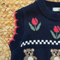 Completo bimba Dr.Kid con gilet blu a orsetti e tulipani, camicia bianca con colletto sangallo e gonna pantalone marrone.