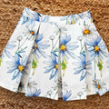 Coordinato bambina con top celeste e gonna a fiori azzurri

