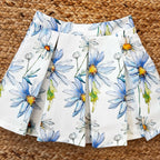Coordinato bambina con top celeste e gonna a fiori azzurri

