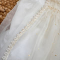Pagliaccetto battesimo panna con dettagli avorio e pizzo ricamato