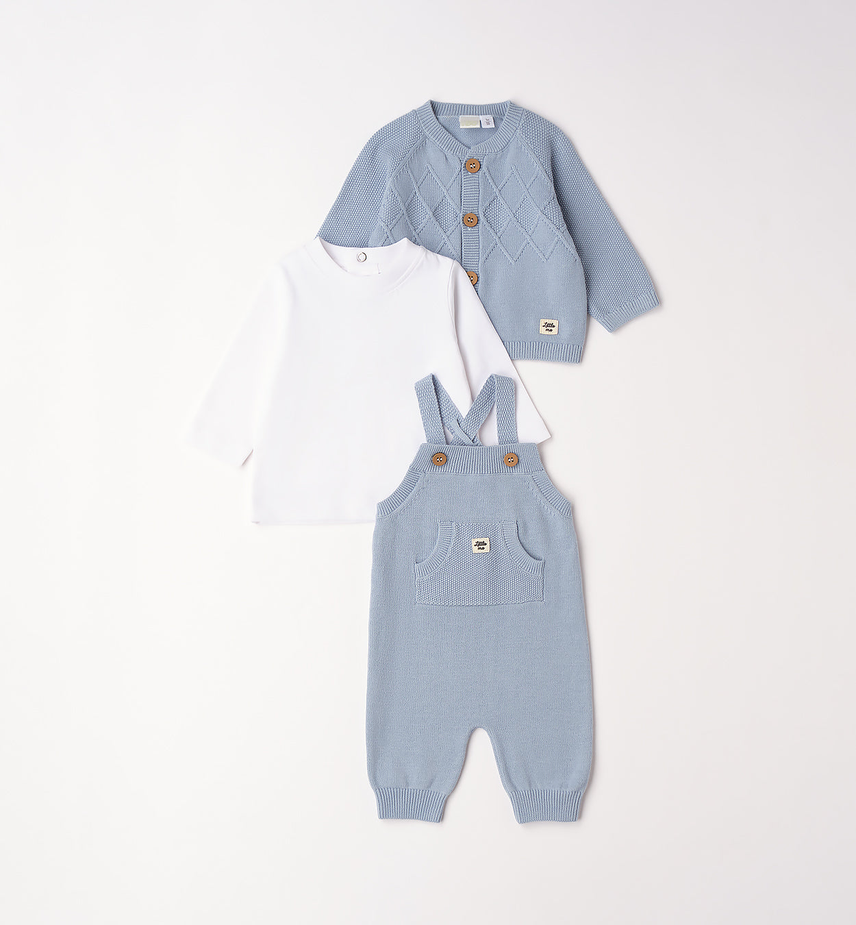 dettaglio maglia cotone neonato con bordi azzurri