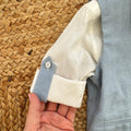 dettaglio manica camicia panna completo bimbo elegante