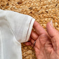Pagliaccetto battesimo bimbo bianco in cotone e lino con colletto sartoriale