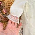 dettaglio manica lunga con polsino in pizzo abito elegante bimba