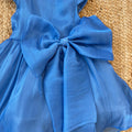 Dettaglio maxi fiocco abito cerimonia bimba blu royal