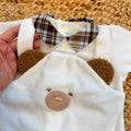 Tutina neonato in ciniglia panna con orsetto tridimensionale e colletto tartan