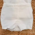 Dettaglio pantaloncino bianco coordinato completo battesimo bimbo