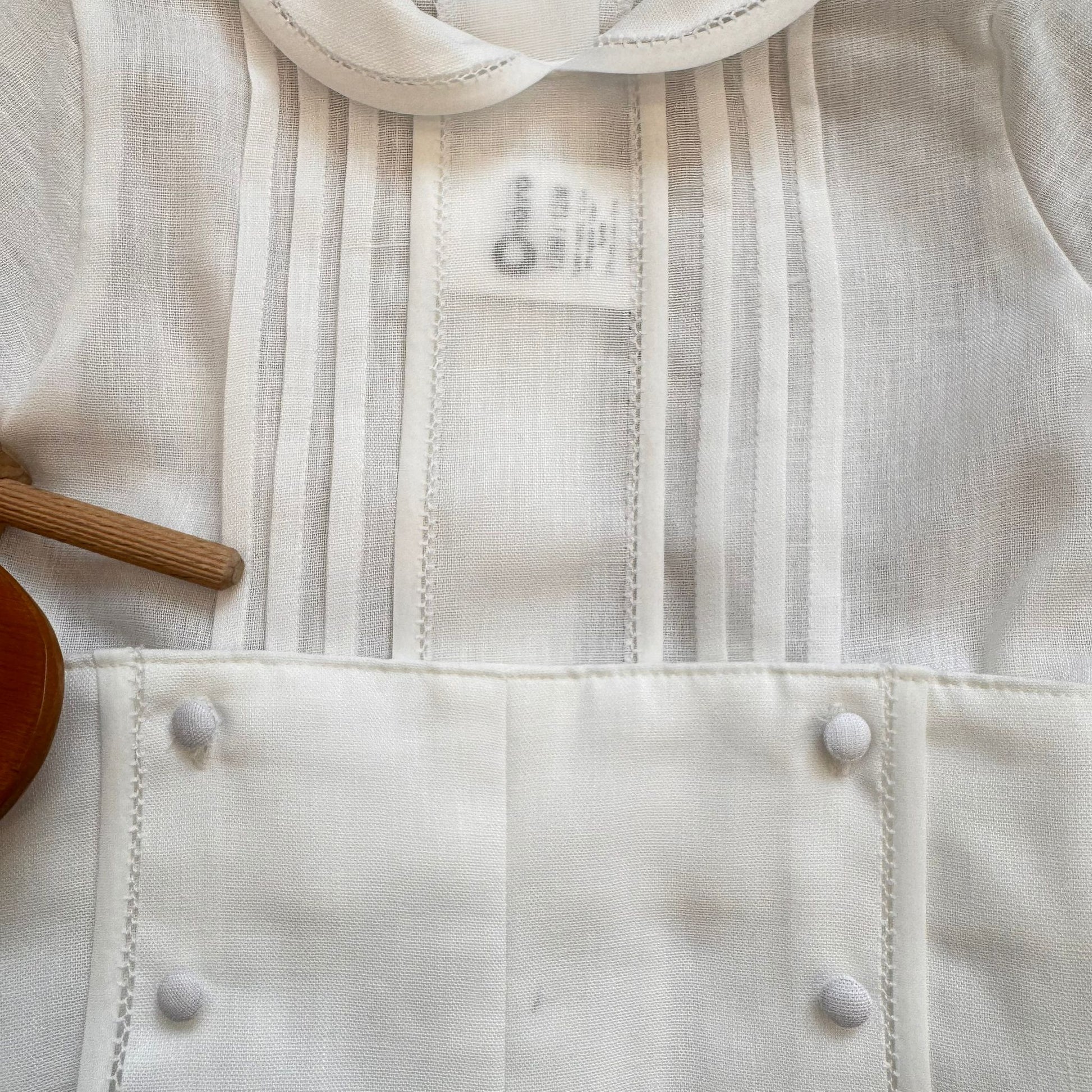Pagliaccetto battesimo bimbo bianco in cotone e lino con colletto sartoriale