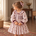 Abito bimba punto smock floreale con fiocchi in velluto bordeaux