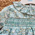 Abito bimba in cotone floreale verde acqua con punto smock e colletto arricciato
