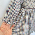Abito bimba tartan punto smock con dettagli bordeaux