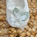 dettaglio scarpe cerimonia bimba con fiore