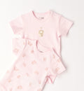 dettaglio stampa cucciolo body neonata rosa