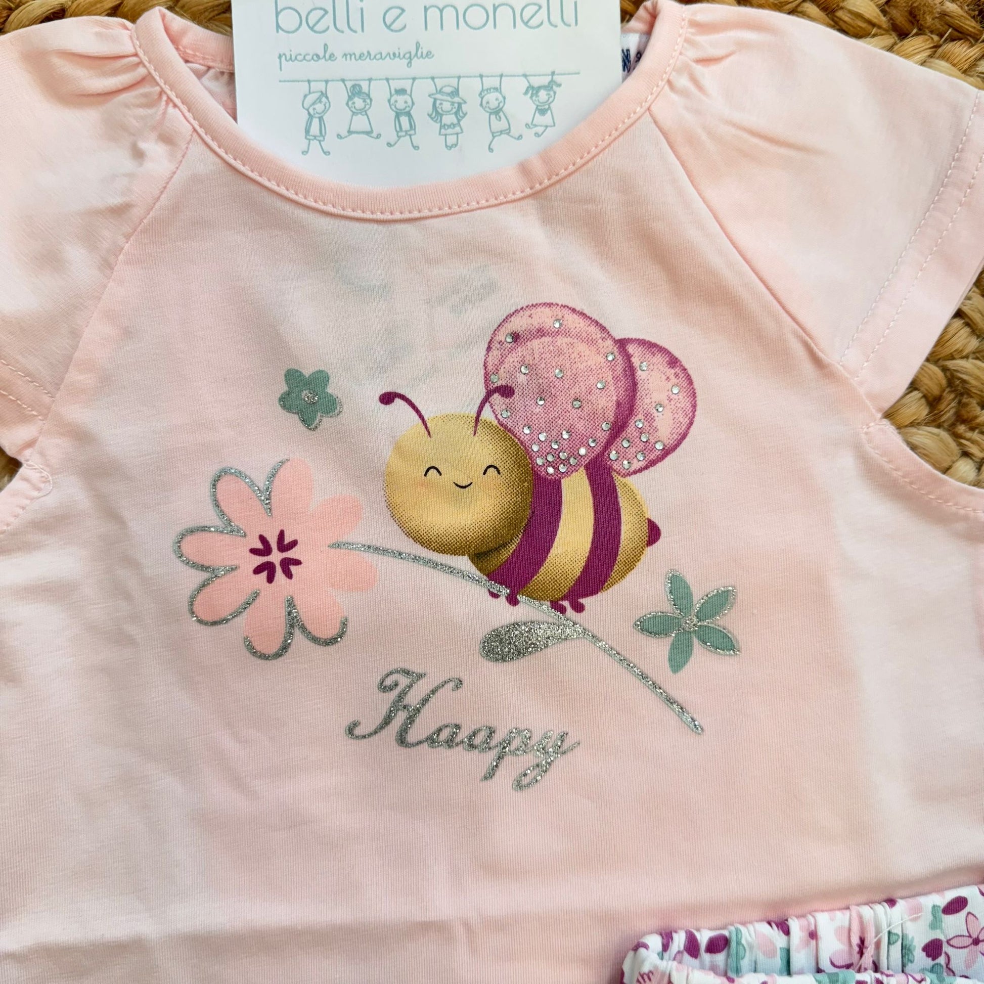 dettaglio t-shirt bimba rosa stampa ape glitter