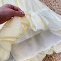dettaglio volume abito bimba giallo chantilly in tessuto leggero
