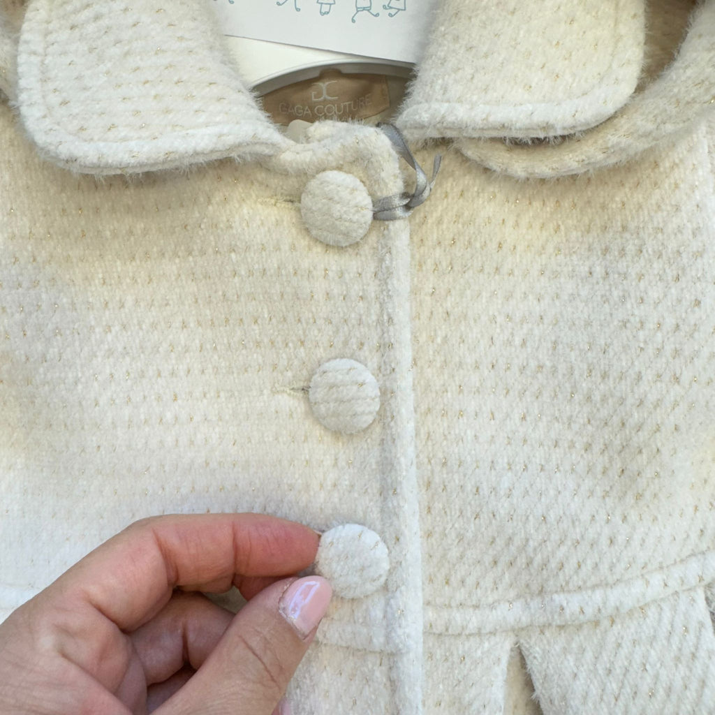 dettaglio bottoni rivestiti cappottino bambina