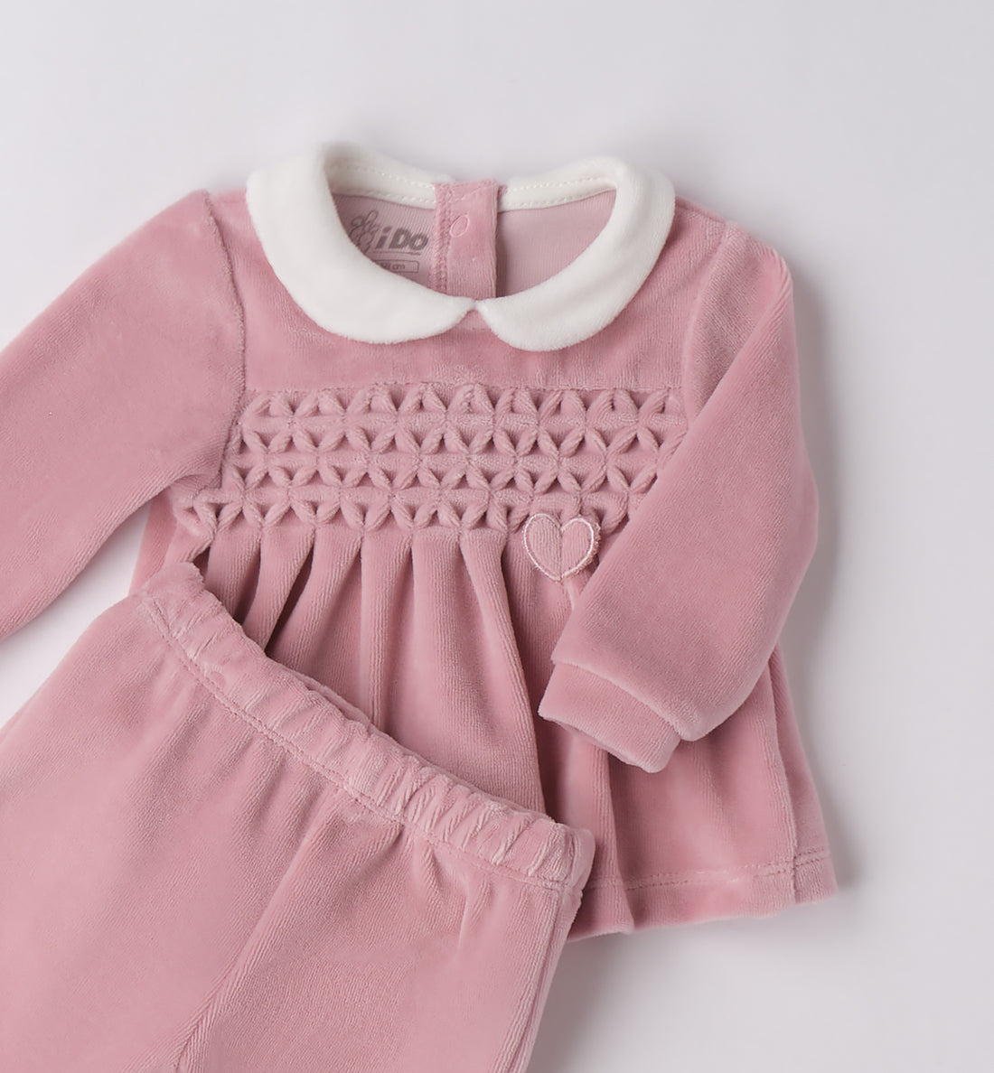 tutina ciniglia rosa neonata ricamo cuore fronte