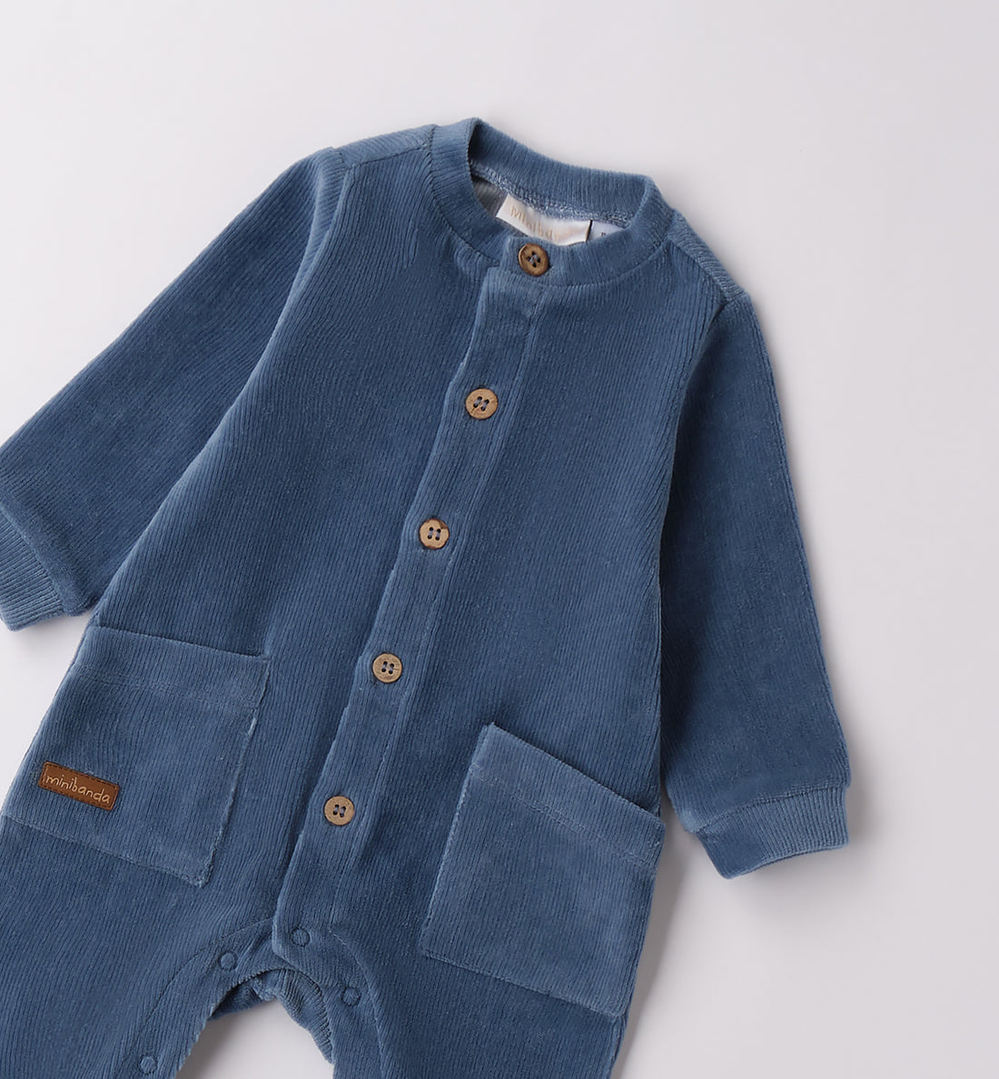 tutina neonato in ciniglia blu con bottoni frontali