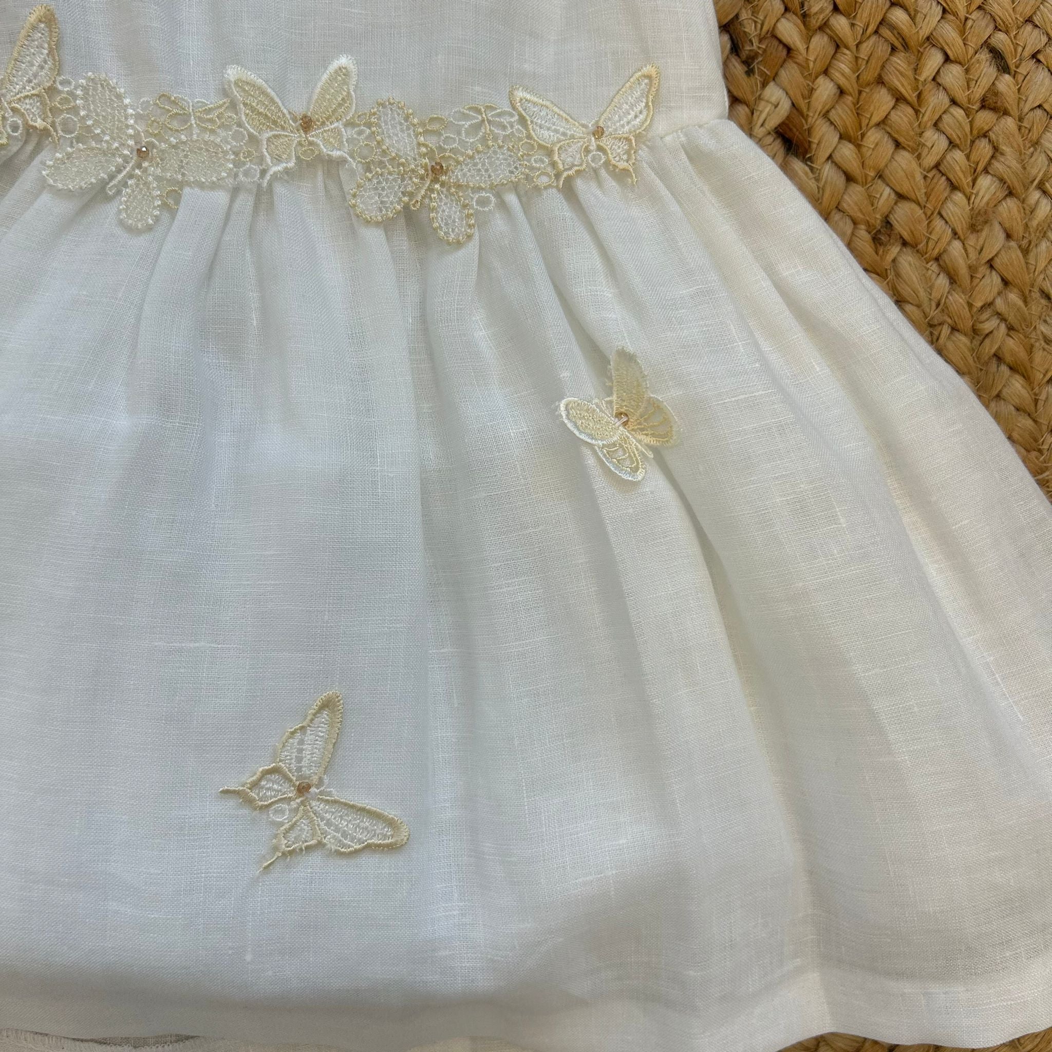 ABITO LINO AVORIO CON FARFALLE