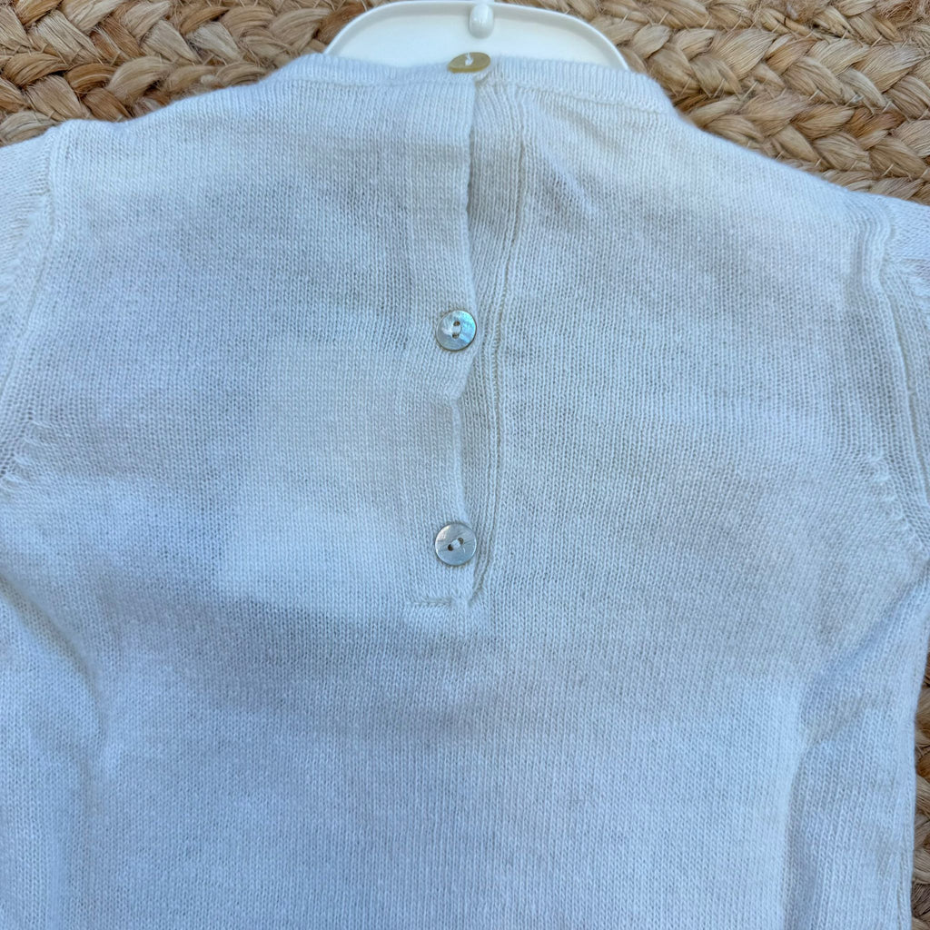 Tutina neonata in lana e cashmere panna con fiocchi rosa