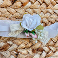 Fascia cerimonia bimba con applicazione floreale romantica