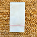 Set lenzuola neonata in cotone bianco con profilo rosa per corredino nascita