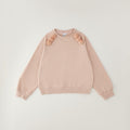Felpa bimba rosa in caldo cotone con pompon sulle spalle