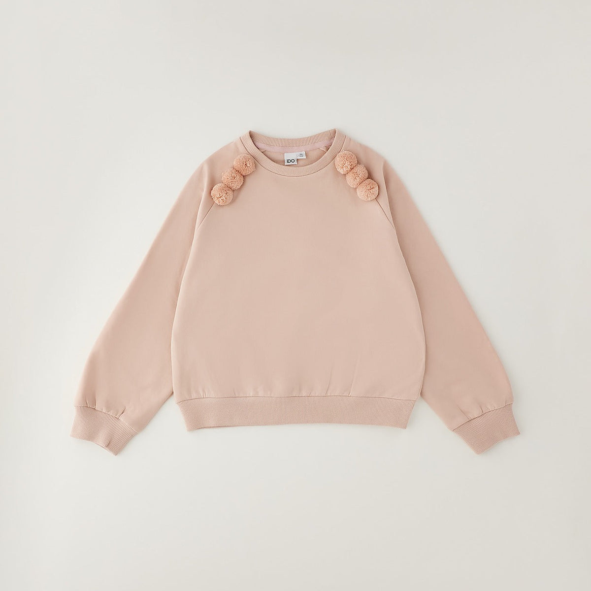 Felpa bimba rosa in caldo cotone con pompon sulle spalle