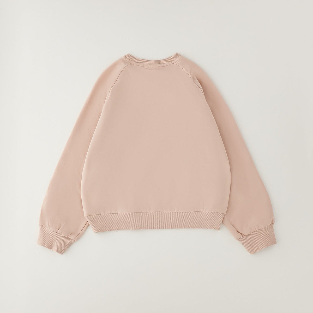 Felpa bimba rosa in caldo cotone con pompon sulle spalle