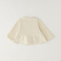 Giacca bimba in caldo cotone color panna con balza e chiusura frontale