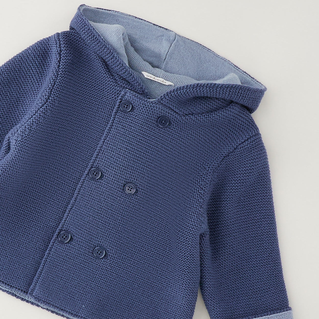 Giacca neonato blu con cappuccio in cotone e lana con chiusura doppiopetto