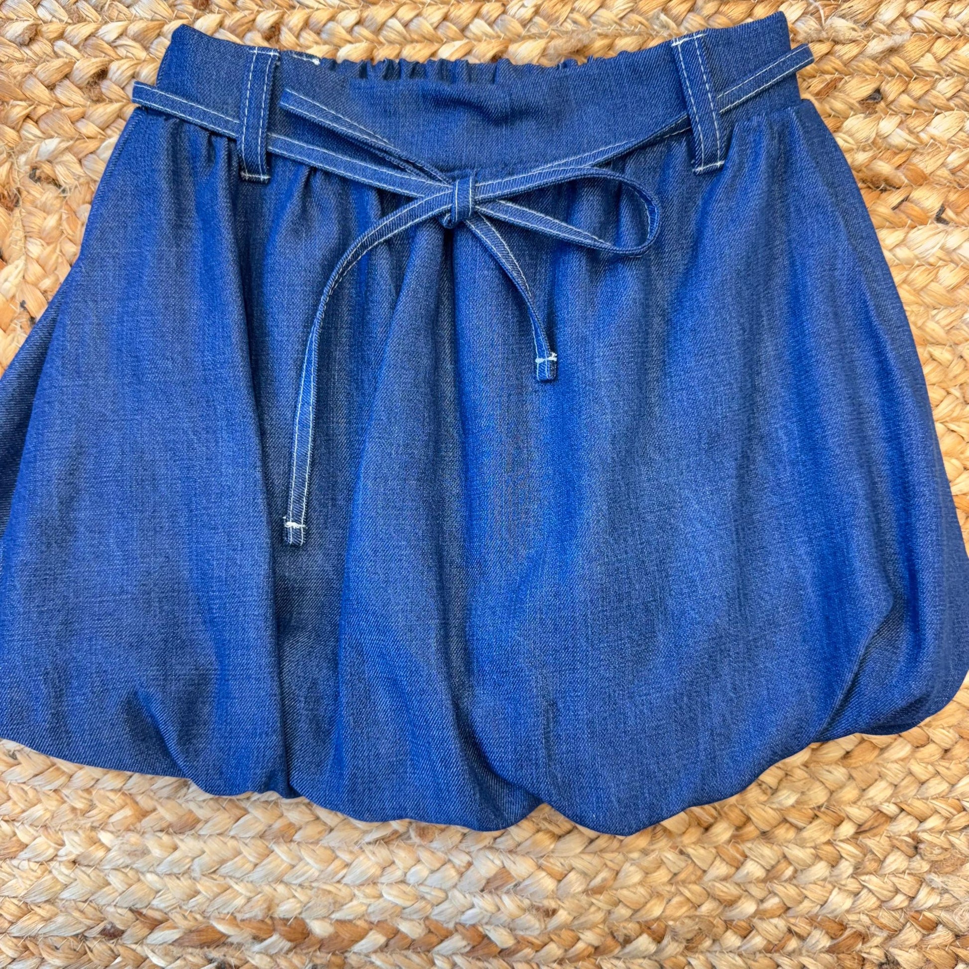 Gonna chambray bambina con cintura a fiocco regolabile

