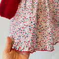Abito bimba con corpino in maglia amaranto e gonna floreale in cotone