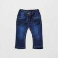 Jeans bimba in denim blu con vita elasticizzata e tasche anteriori