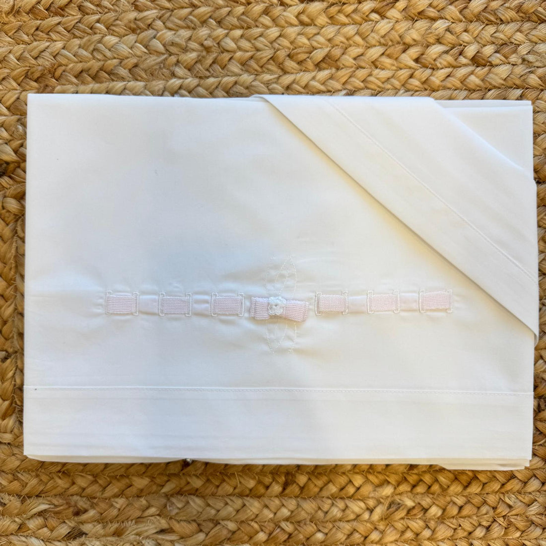 lenzuolino neonata bianco in cotone con fiocco rosa
