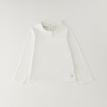 	Maglia bambina bianca Sarabanda in cotone con colletto arrotondato e maniche lunghe