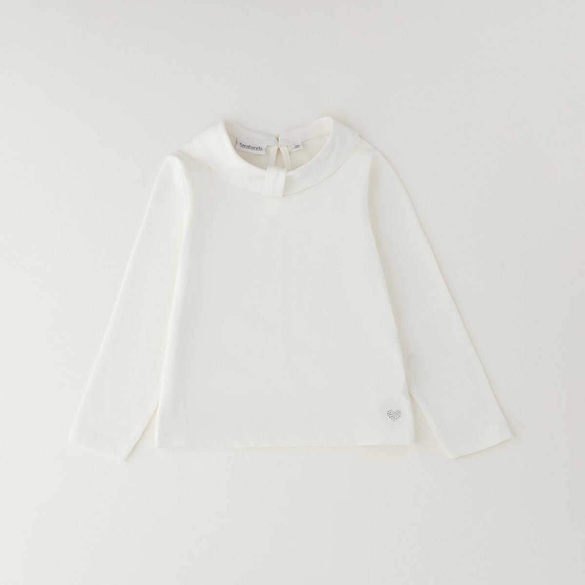 	Maglia bambina bianca Sarabanda in cotone con colletto arrotondato e maniche lunghe
