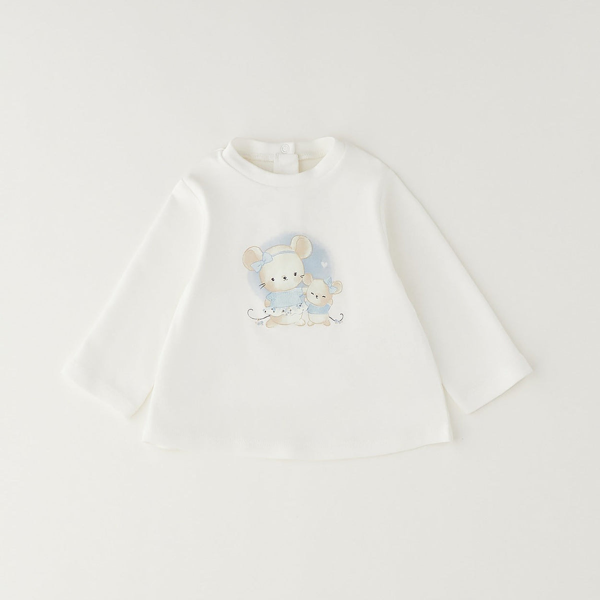 Giacca bimba in caldo cotone color panna con balza e chiusura frontale