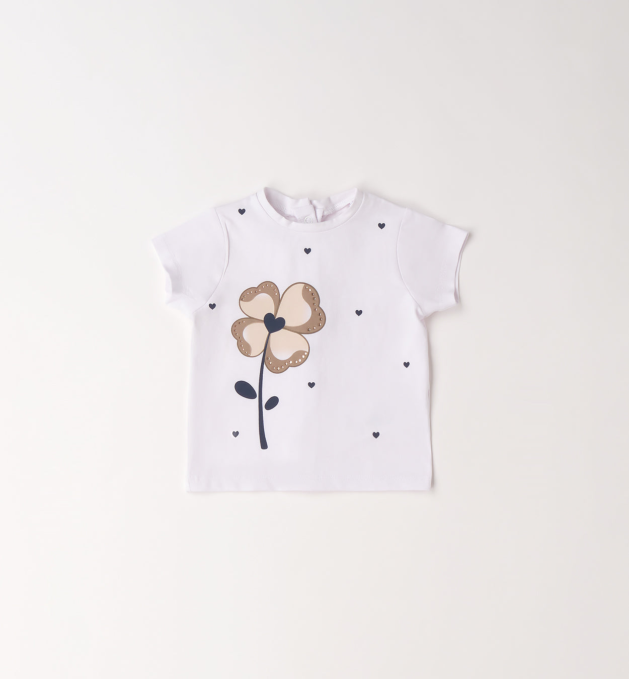 Maglia bimba bianca con fiore decorativo e cuoricini in cotone elasticizzato
