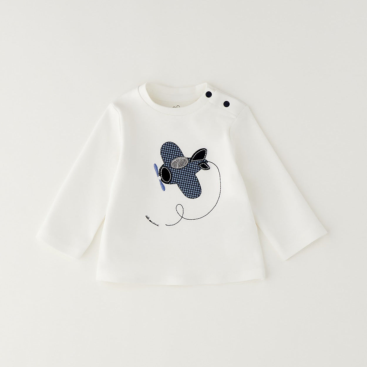Pantalone bambino blu a microfantasia visto dal retro con tasche applicate