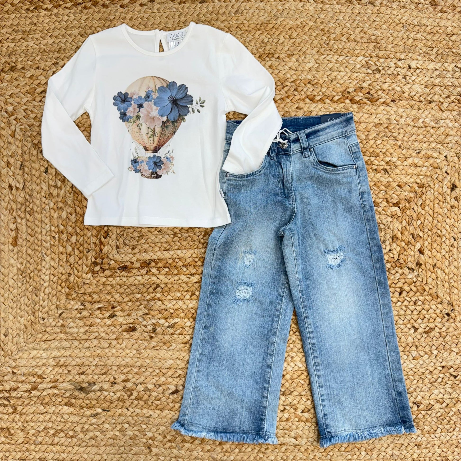 maglia bianca bambina con mongolfiera azzurra